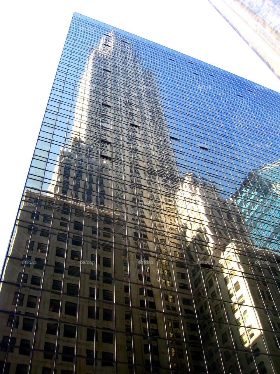 Reflections of Chrysler. The Chrysler Building reflected off a glass building across the street in Manhattan, New York