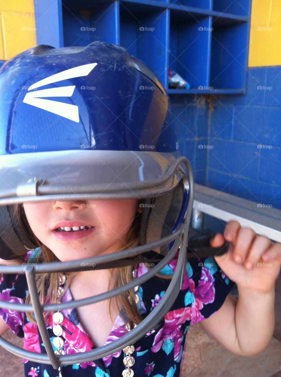 future pro softball player. she is 3 and attended our travel softball practice where she got busy trying on gear.