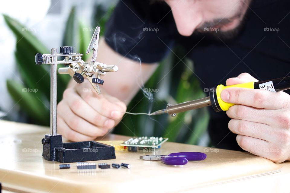 The soldering of electronics 
