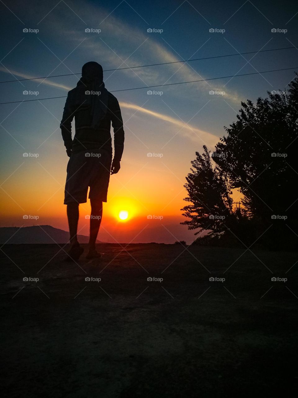 Man during sunset hd picture.