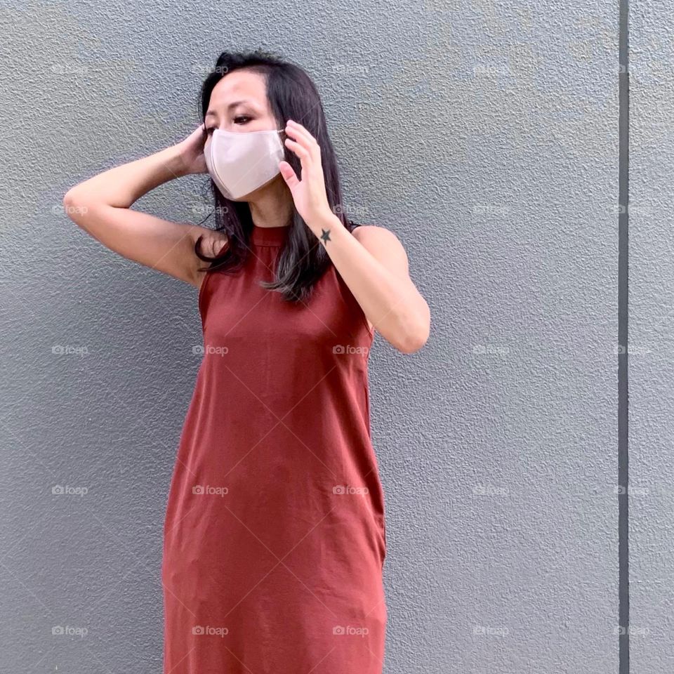 Asian woman in silver grey ash hair colour outdoor 