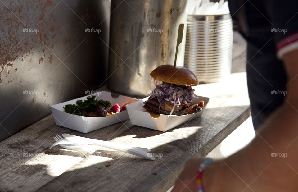 Burger on wooden table