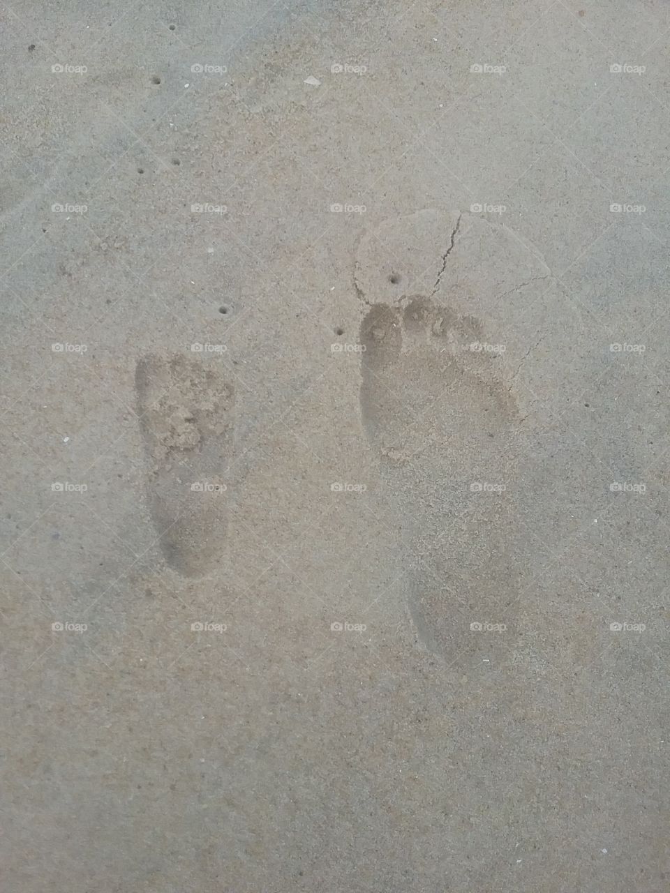 Big & Little Footprints in the Sand