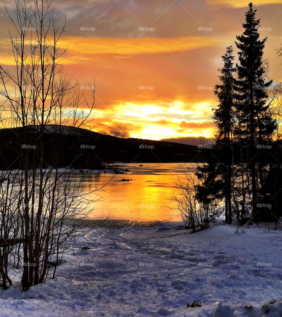 Sunset on winter lake