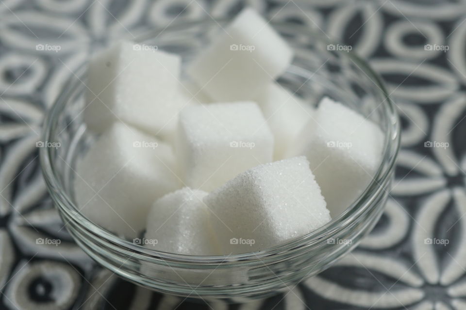 Sugar cubes in a dish 