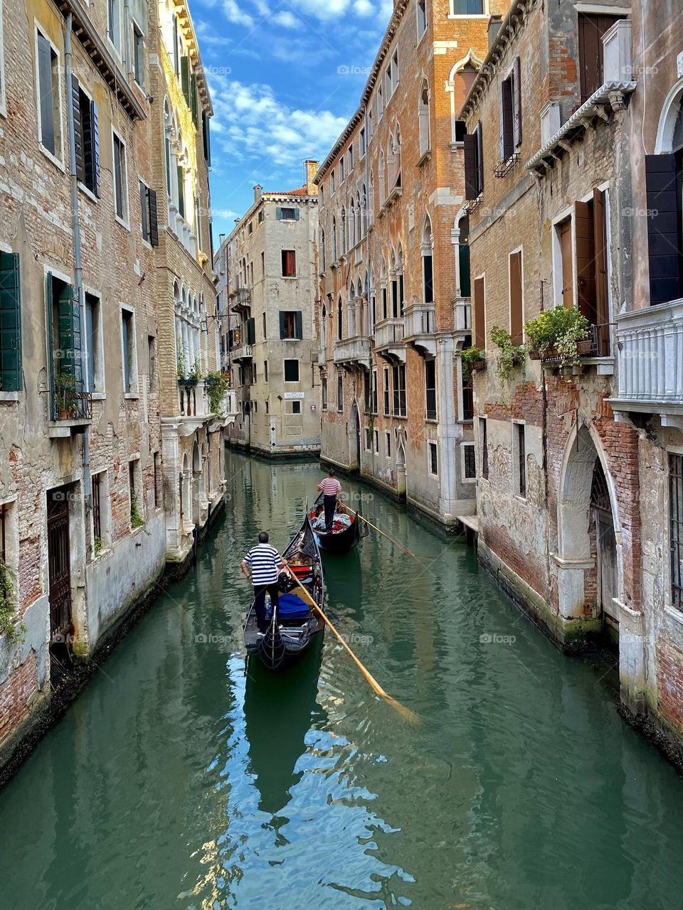 Gondoliers on the canals of Venice