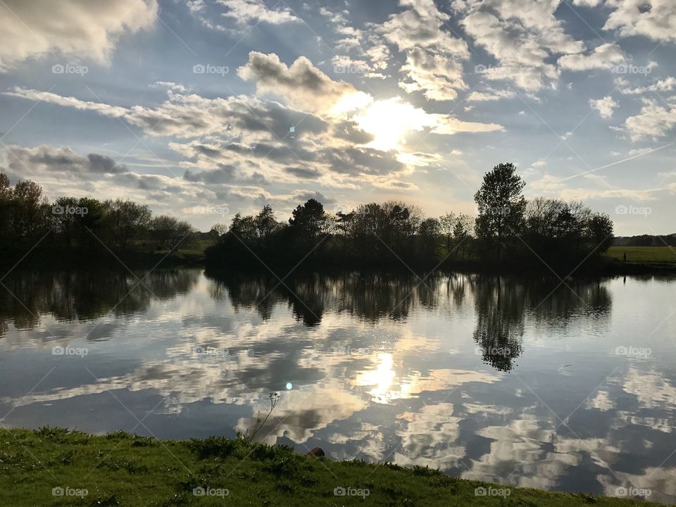 Nantwich lake as the sun started to set in the sky. The clouds and reflections looked magnificent. 
