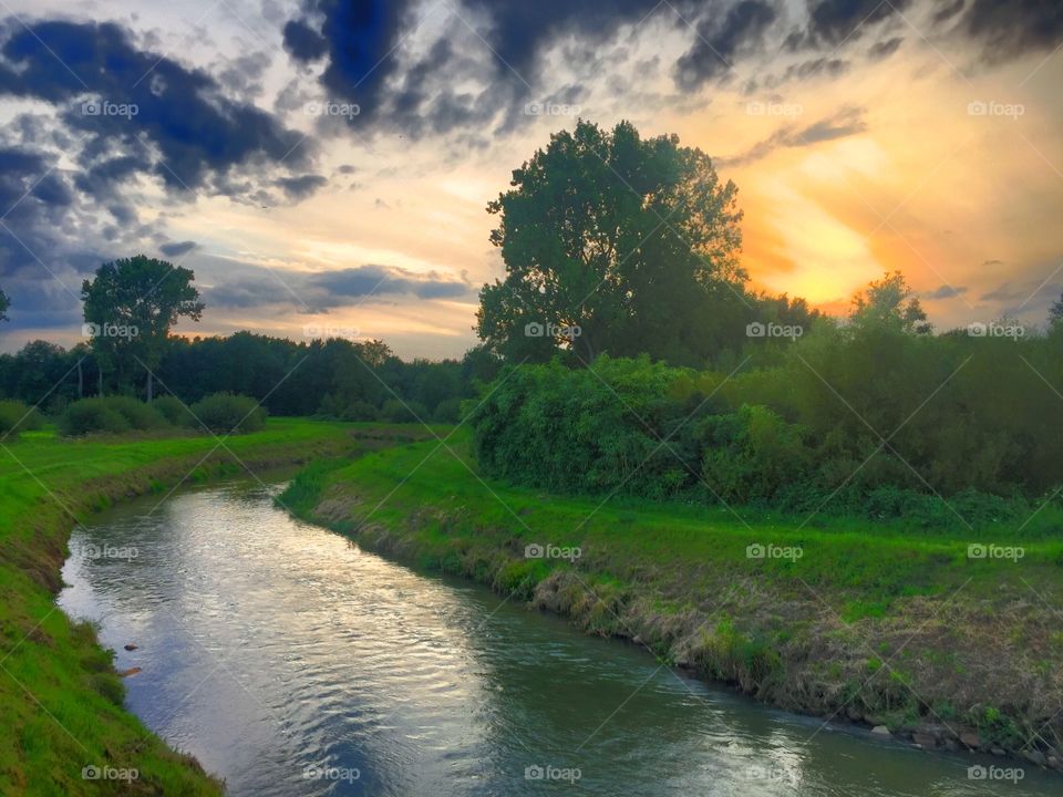 Dramatic sunset over the river