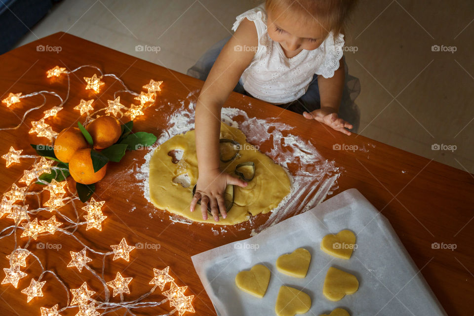 Little girl preparing snacks for Santa