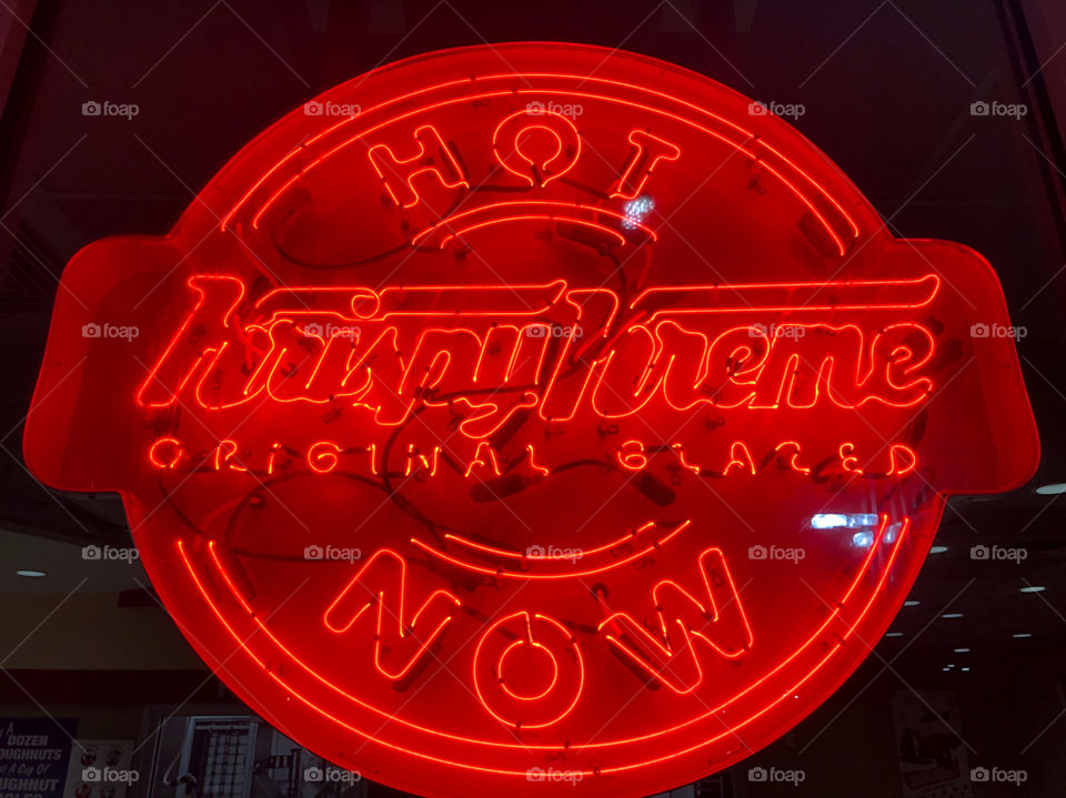 Neon Krispy Kreme sign. Hot Now.