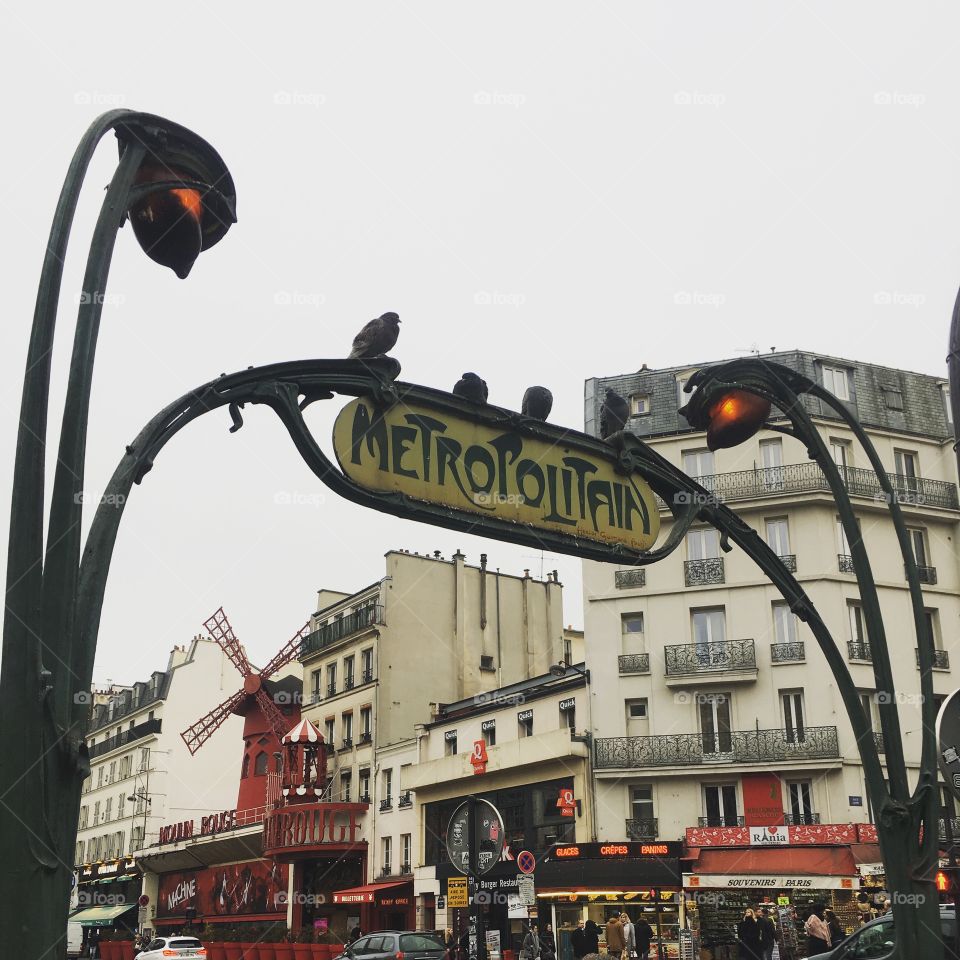 The subway station in Paris, Metropolitain, with the world famous Moulin Rouge.