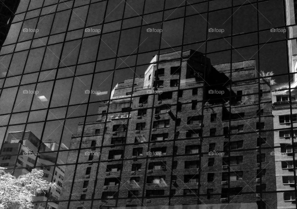 Building in building . Reflection 