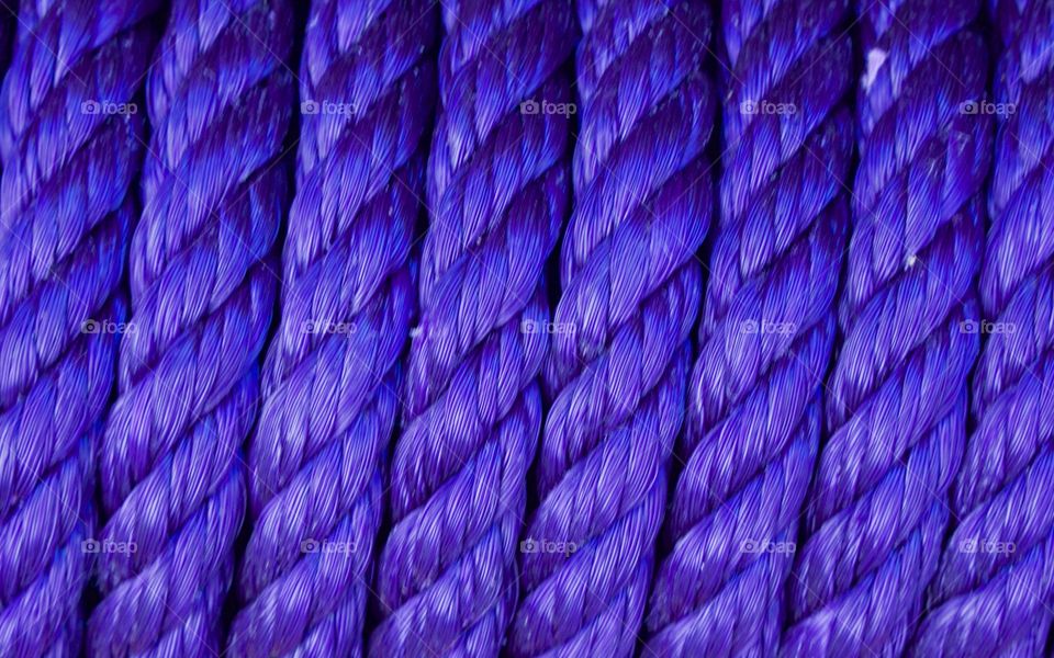 Full frame of blue braided rope