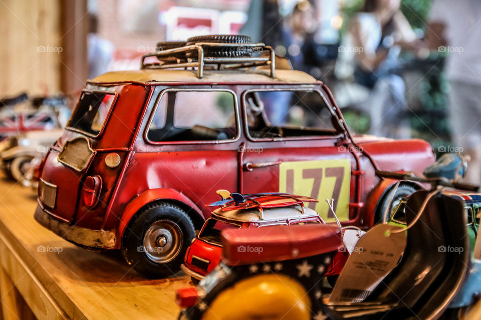 Mini Model red car in toy shop feel like child again close-up 