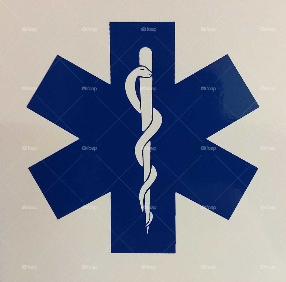 Blue and white medical sign