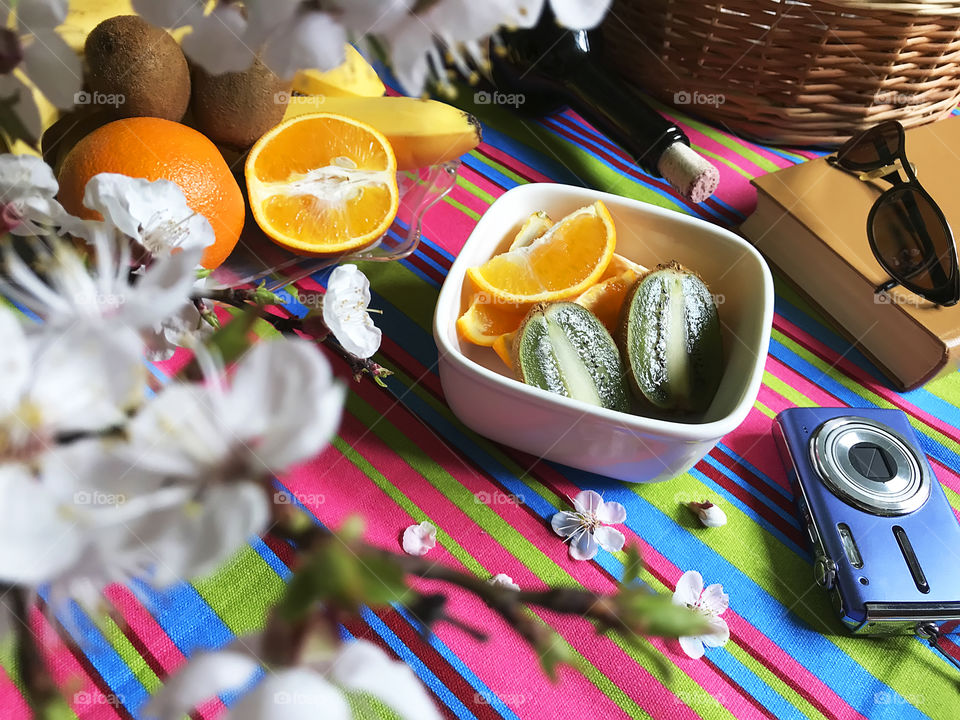 Oranges, kiwis, bananas for picnic outdoors 