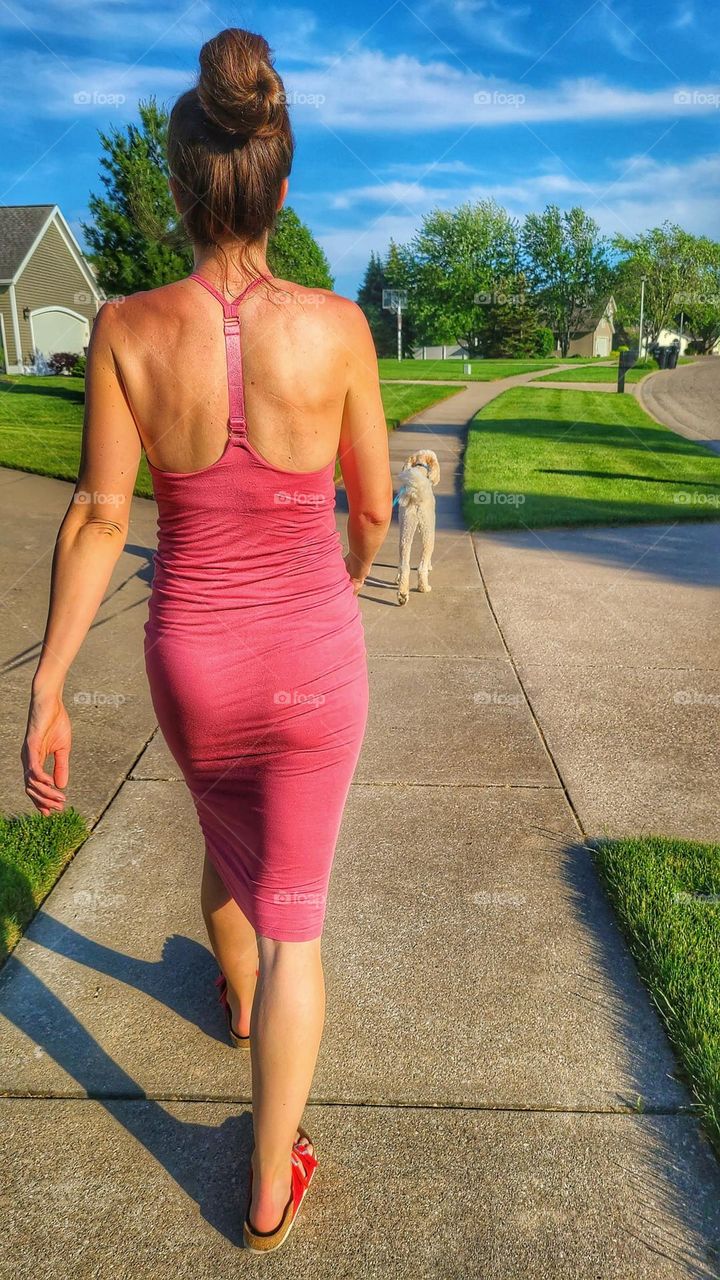 walking the dog in a sexy dress