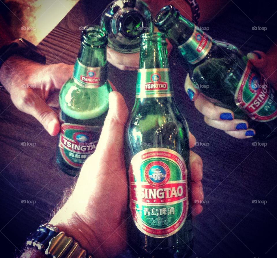 cheers! tsingtao beer time with friends