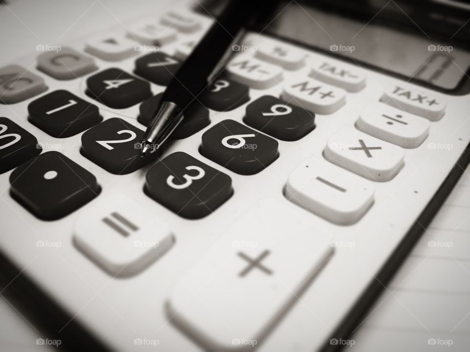 Calculator and biro pen