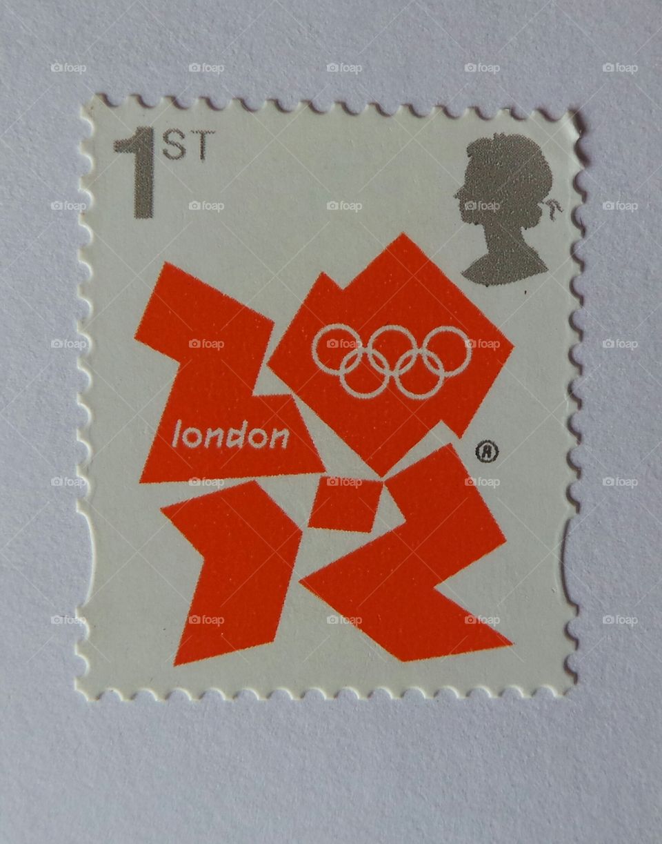 1st class royal mail 2012 London Olympics stamp . united Kingdom,  British,  Stamps ,
macro,
closeup,