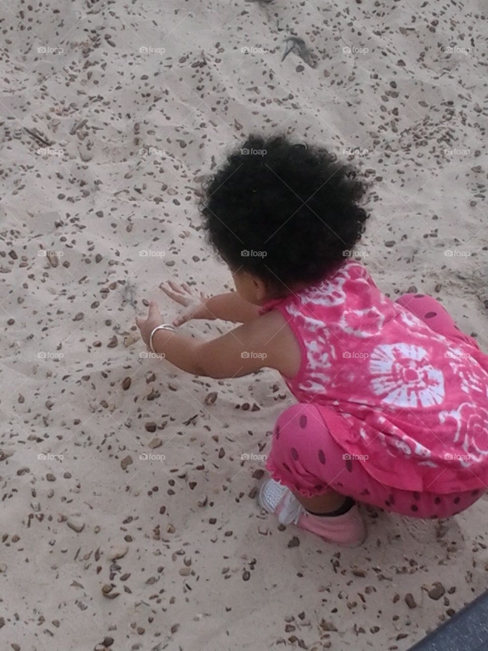 Handprints in the Sand