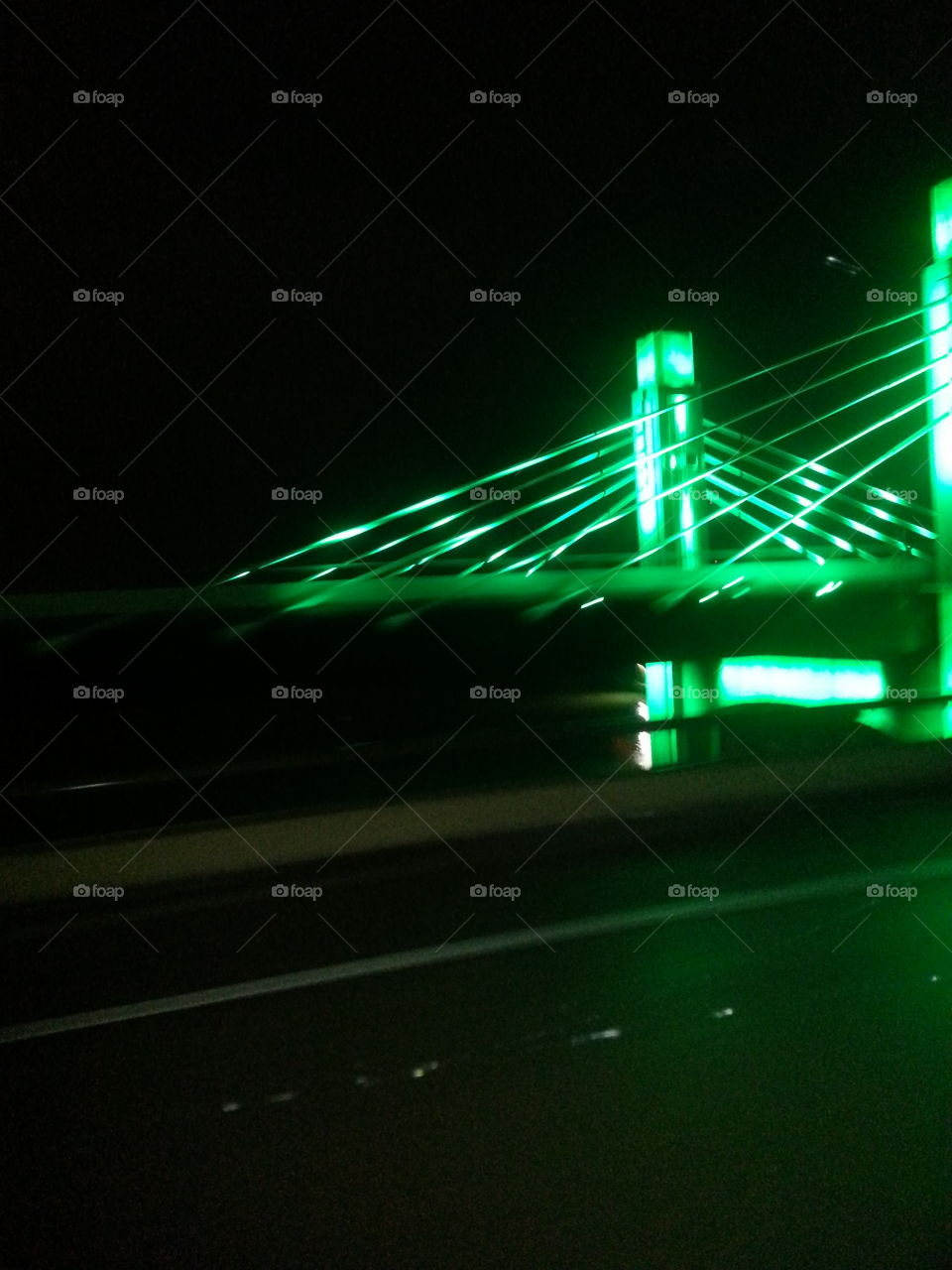 green tonight. new bridge by baylor stadium a different color every time I pass