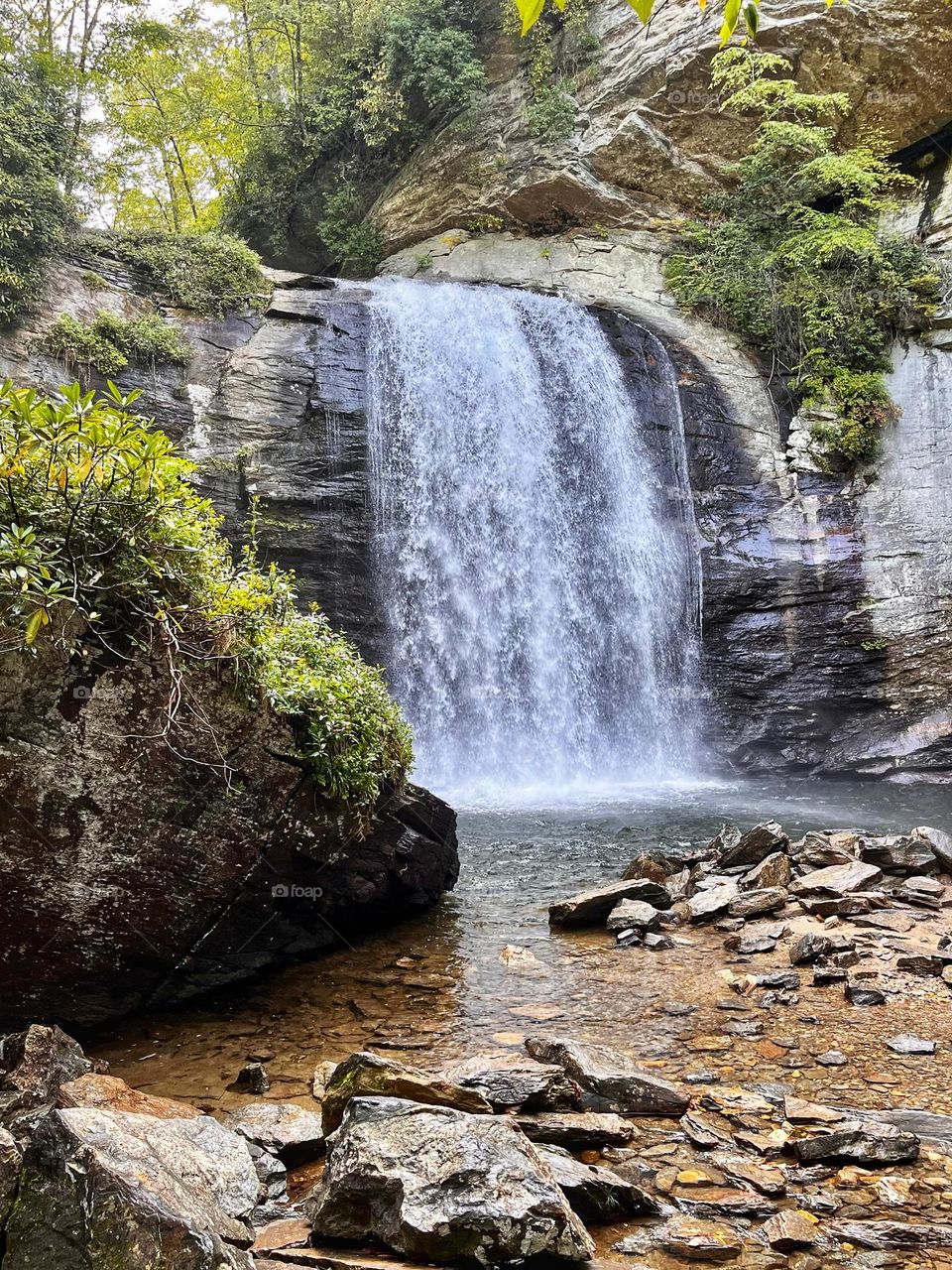Beautiful waterfall in North Carolina cascading into the river