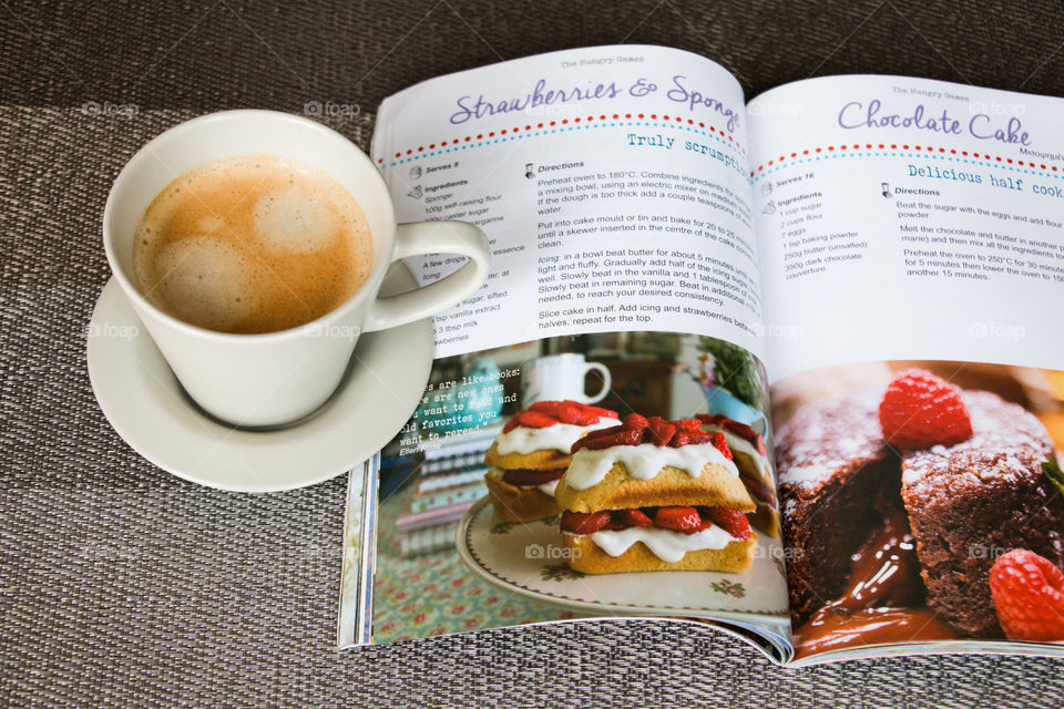 cup of coffee and a recipe book