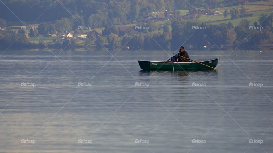 Fisherman In Lake Sempach