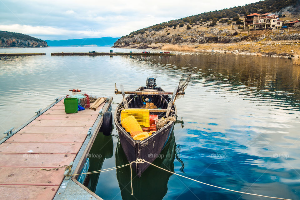 Fishing Boat In The Lake Port
