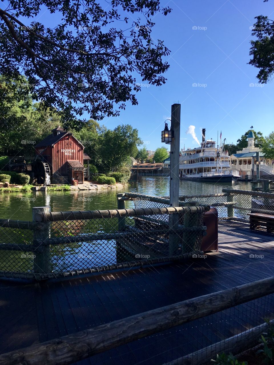Riverboat and Mill view at Disney World's Magic Kingdom.
