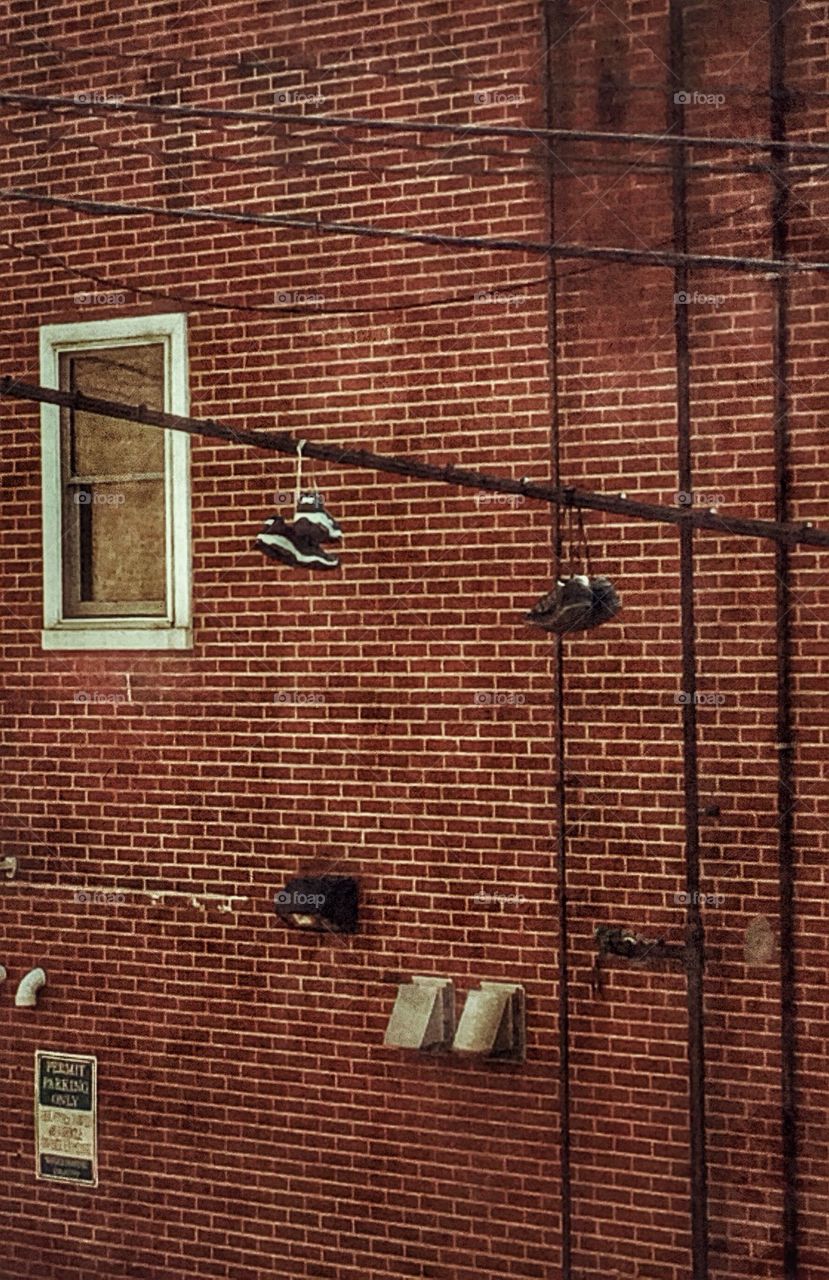 Shoes on a wire