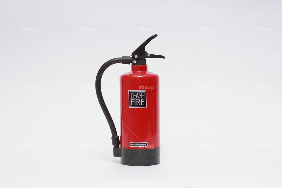 an extinguisher to cease fire