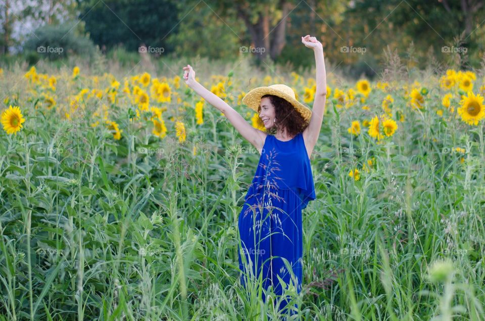 Beautiful Young Woman Dancing Outside in Nature