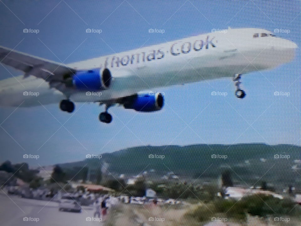 The arrival of this air giant landing at a most dangerous airport in the world next to tourists an exciting landing.
