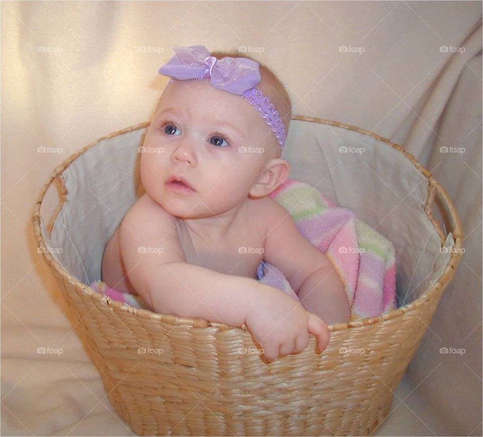 Cute baby in basket