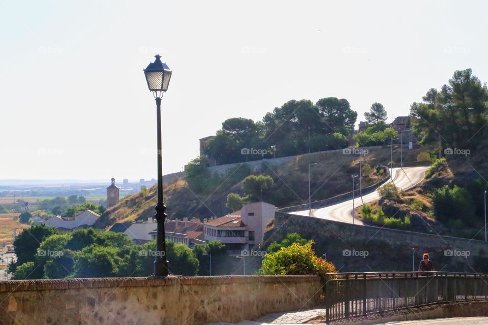 Street lamp and a road leading to Toledo 