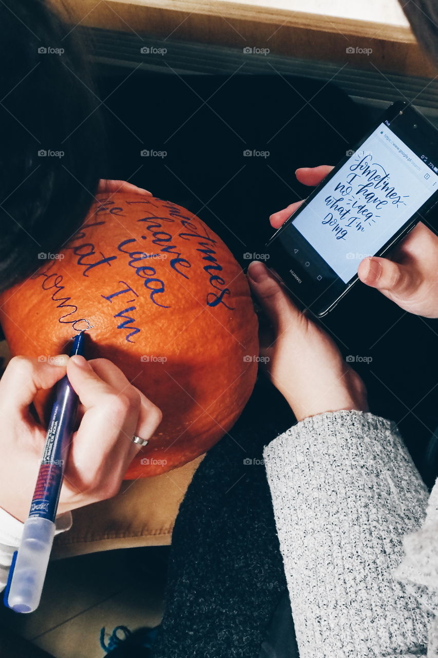 Writing on the pumpkin