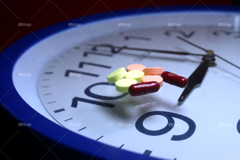Capsules and tablets on time medication