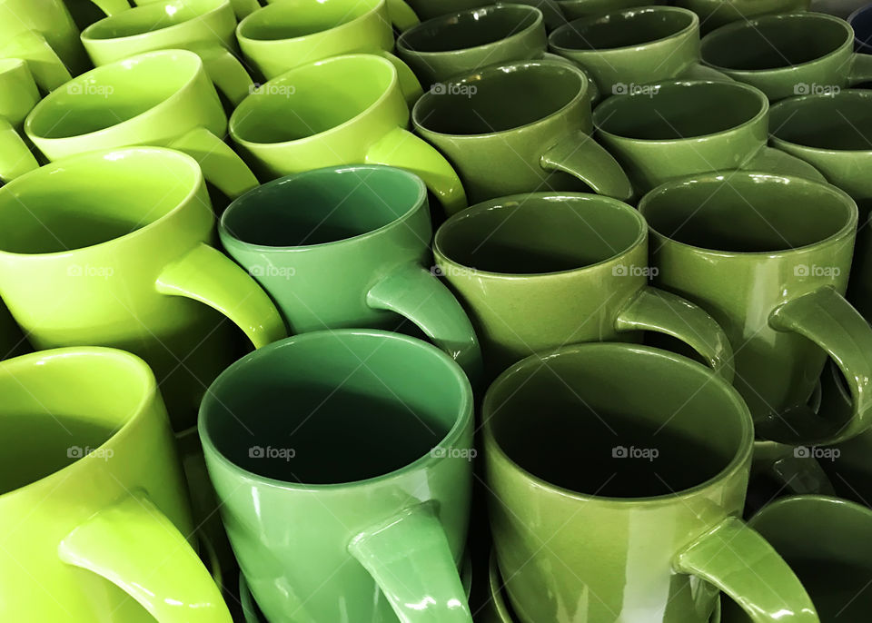 Many green colorful cups 