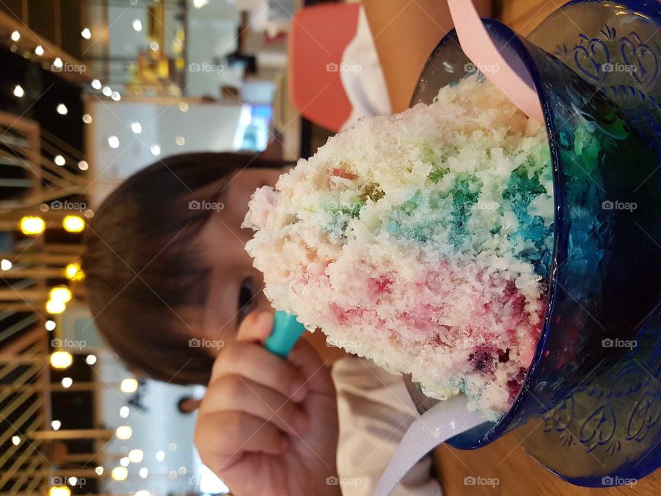 kid eating colorful bingsu Korean ice cream