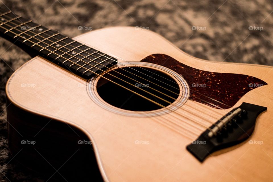 The tool of an American Icon! A beautiful Taylor acoustic guitar.