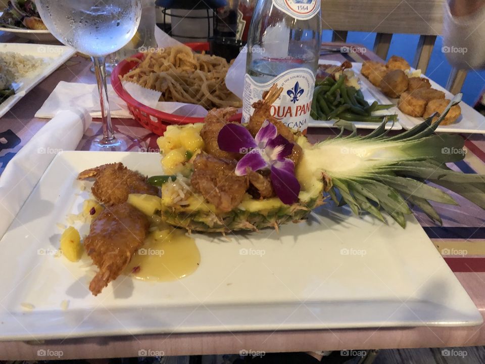 Fried Shrimp And Rice Served in A Halved Pineapple 