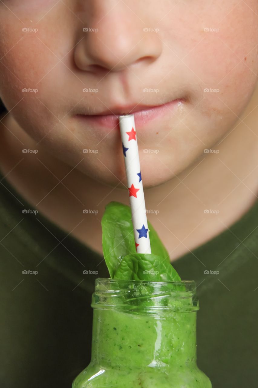 Enjoying a green smoothie