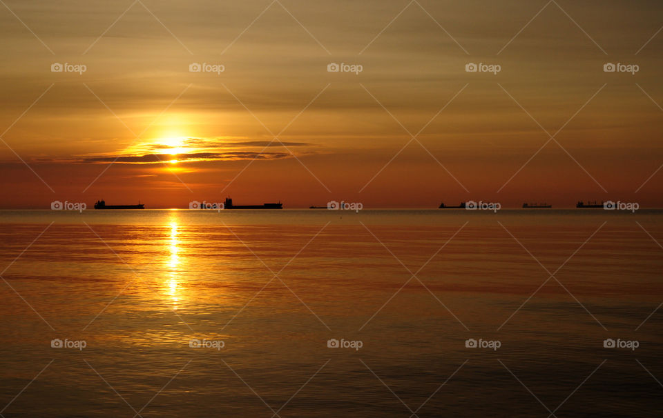 View of sunrise at sea