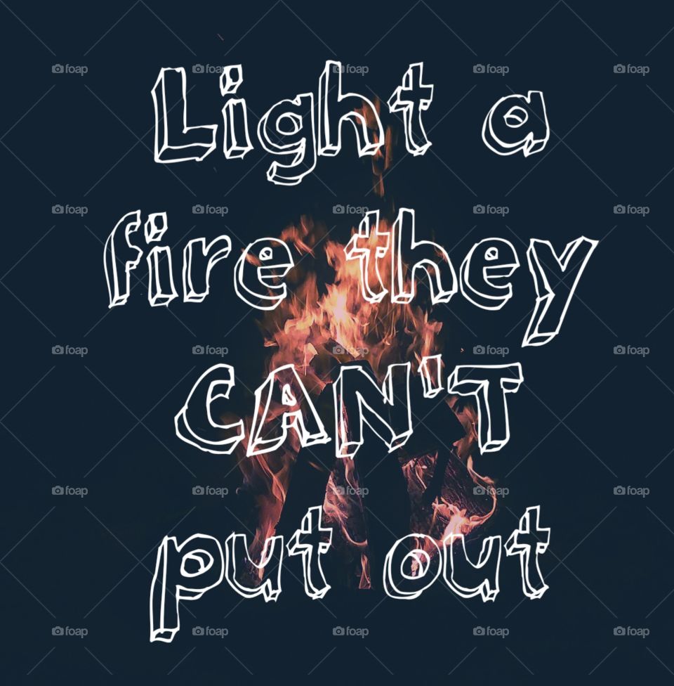 a beautiful and inspirational fire quote chalk outline words against a beautiful flame background