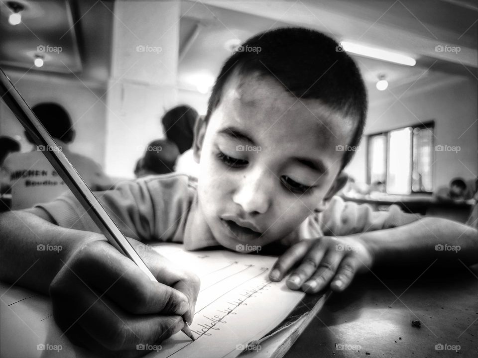 With a pencil he now shapes letters but in future with these knowledge he will design the better world.
