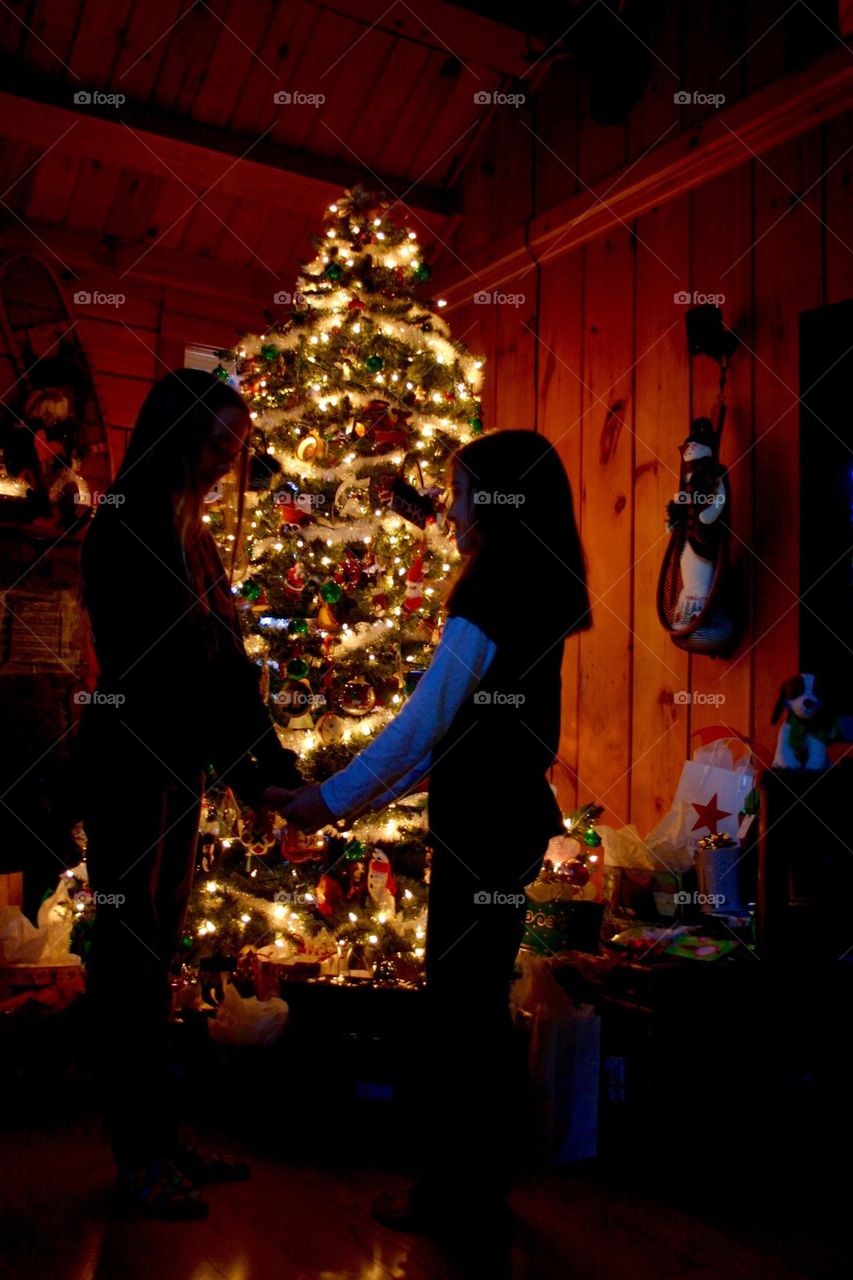 By the Christmas tree