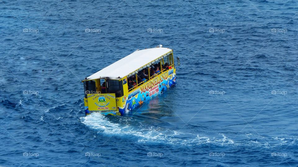 Bus floating in the ocean water