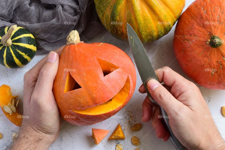 Carving pumpkins for Halloween 